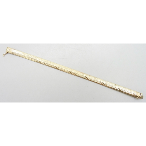 7003 - A 14ct gold bracelet with textured design, 14g, 18.5cm