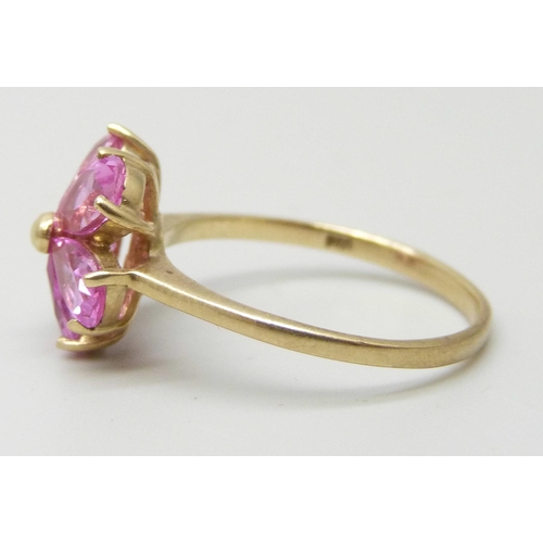 7009 - A 9ct gold pink sapphire flower cluster ring, 2.3g, O