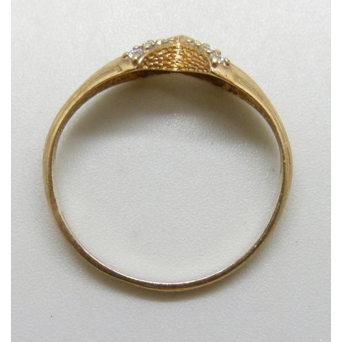 7011 - A 9ct gold and white stone ring, 1.8g, P