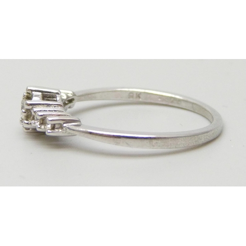 7018 - A 9ct white gold and diamond ring, 1.5g, L