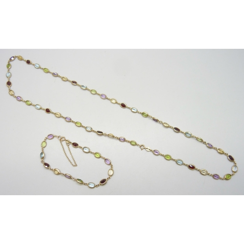 7026 - A 9ct gold matching necklace and bracelet, set with amethyst, topaz, citrine, peridot and garnets, 2... 