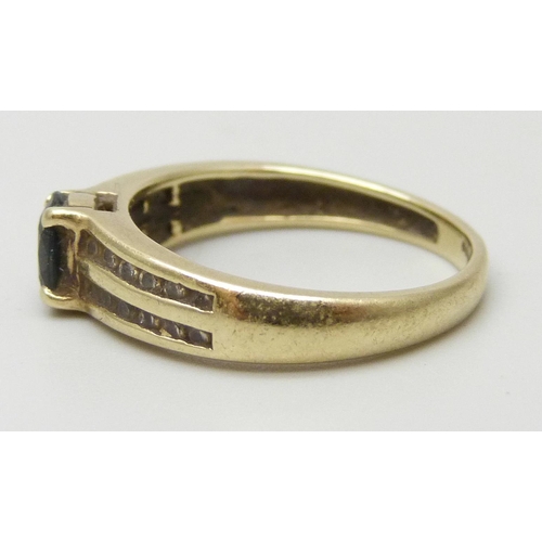 7034 - A 9ct gold, sapphire and diamond ring, 2.2g, K/L
