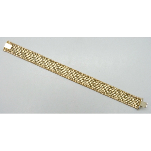 7036 - A 14ct gold woven link bracelet, marked 585, 18.7cm, 13.4g total weight, with receipt from Andros da... 