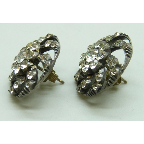 7037 - A pair of early 20th century paste set earrings, possibly converted from brooches or pins, 2.2cm