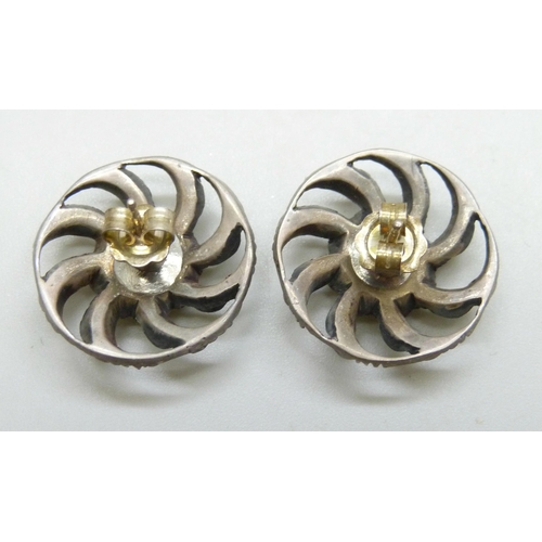 7037 - A pair of early 20th century paste set earrings, possibly converted from brooches or pins, 2.2cm
