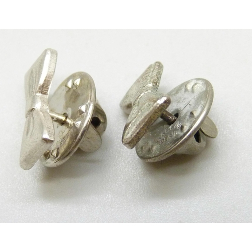 7038 - A pair of Eric Knowles Antiques and Collector's Club hallmarked silver pin badges in the form of bow... 