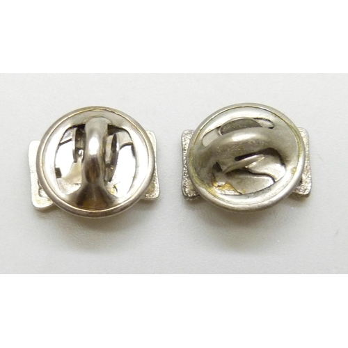 7038 - A pair of Eric Knowles Antiques and Collector's Club hallmarked silver pin badges in the form of bow... 