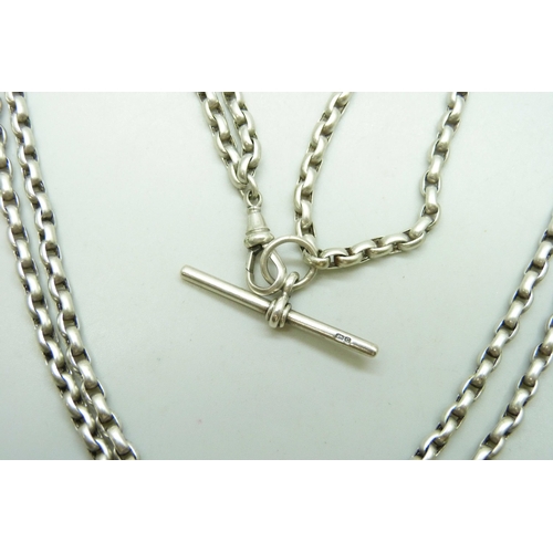 7050 - A double row white metal long guard chain necklace, hallmarked T bar, unmarked dog clip and chain, 7... 