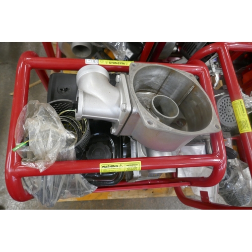 A large pallet of spares or repairs petrol driven semi trash pumps ...