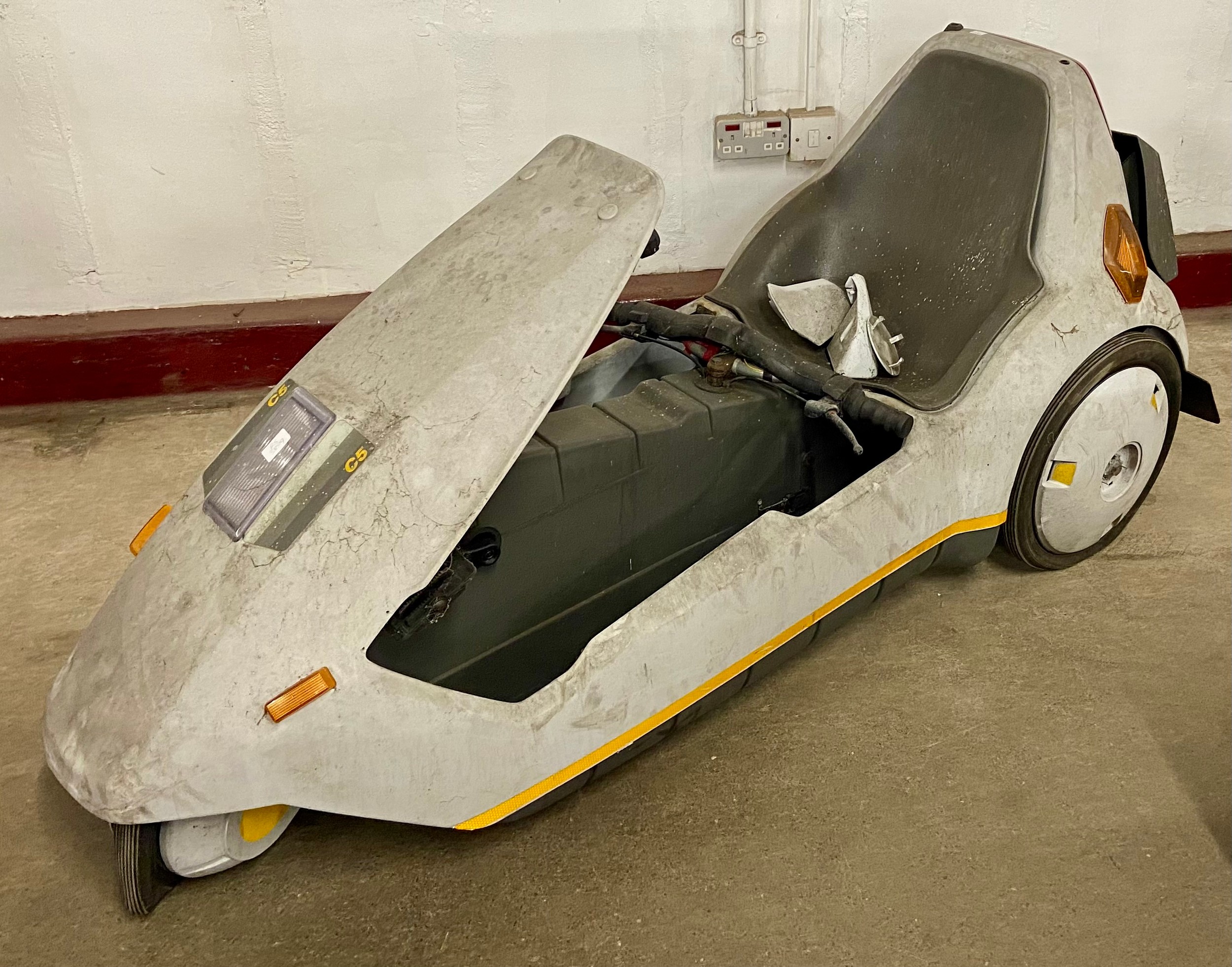 A Sinclair Vehicles Sinclair C5, designed by Sir Clive Sinclair, a/f