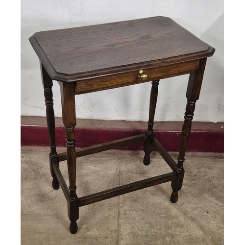 198 - An oak single drawer side table