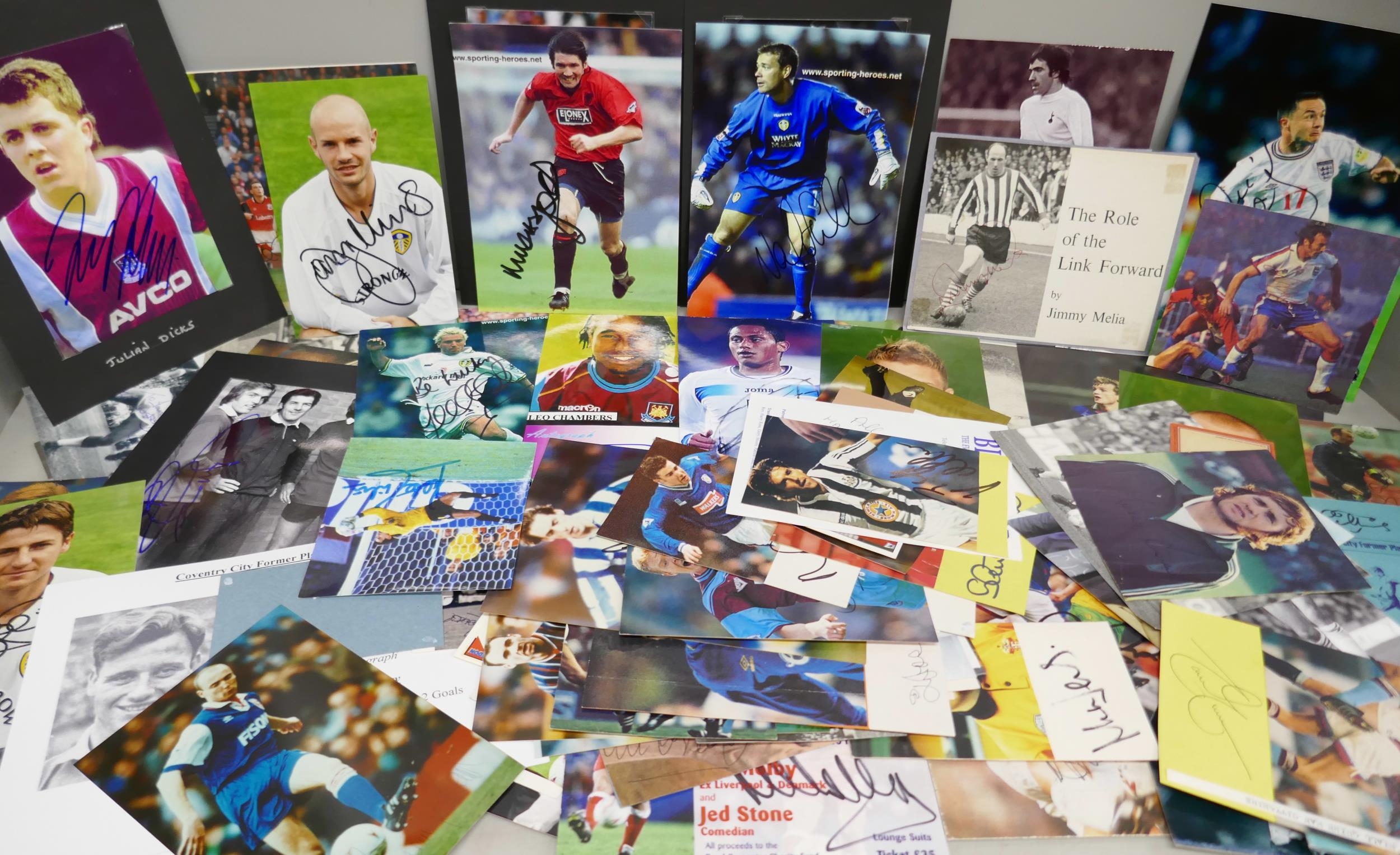 A collection of signed football players cards, cuttings and some ...