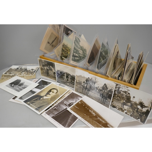 2072 - A wooden box of vintage postcards