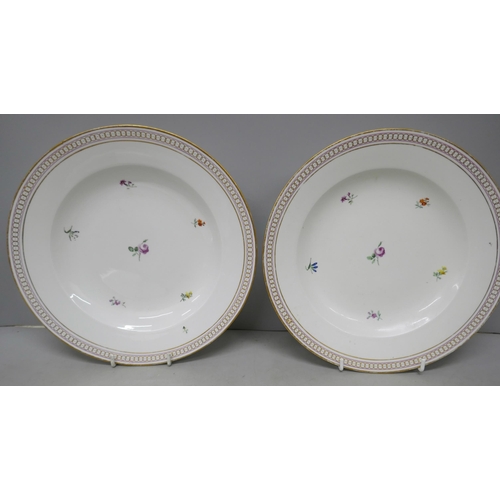 2078 - Three floral plates with stamp on the base of one plate 'Made in Occupied Japan'