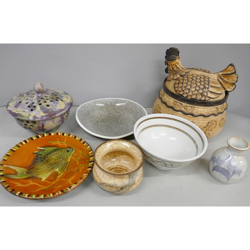 2104 - Seven items of studio pottery including a signed dish with fish detail