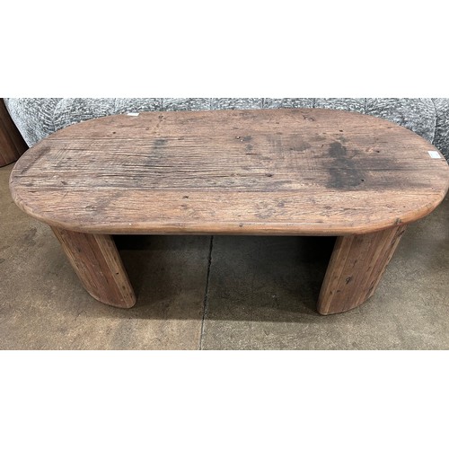 3204 - A driftwood oval coffee table
