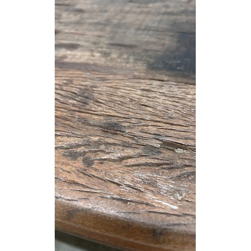 3204 - A driftwood oval coffee table