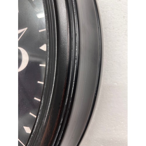 3208 - A ‘William Sutton and Co’ modern wall hanging clock