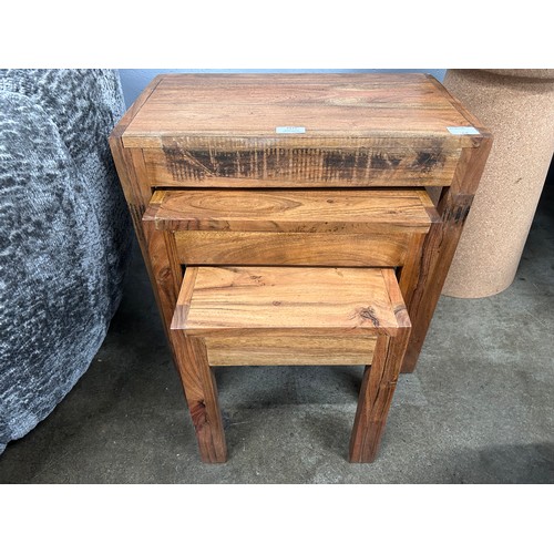 3209 - A solid wood nest of three tables