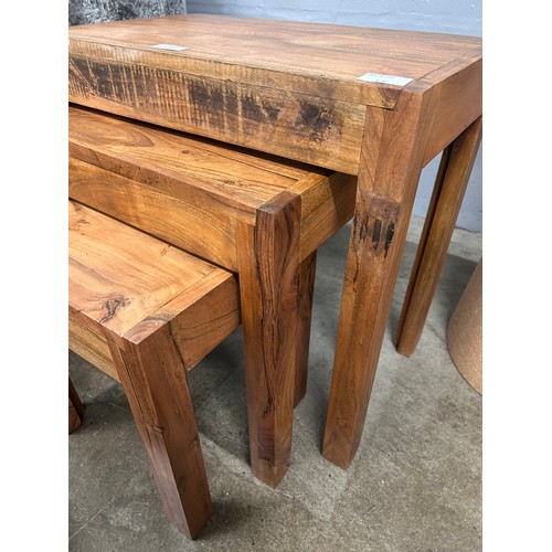 3209 - A solid wood nest of three tables