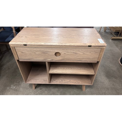 3216 - A Holcot oak convertable bookcase/dining table