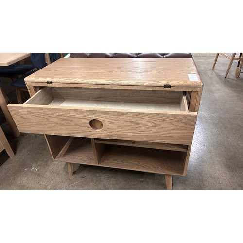 3216 - A Holcot oak convertable bookcase/dining table
