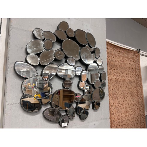 3220 - A pebble wall hanging mirror