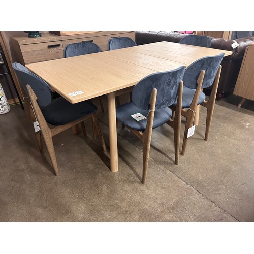 3235 - An Andersson Bianco oak extending dining table with a set of six Bari Opulence charcoal dining chair... 