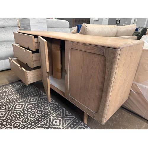 3242 - A Holcot mid century style oak 2 door, 3 drawer sideboard