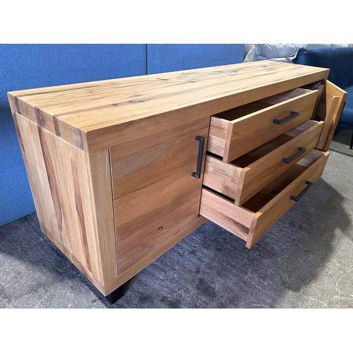 3181 - A solid oak two door three drawer sideboard