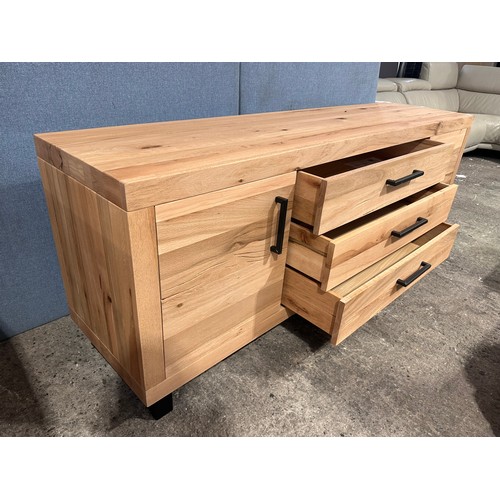 3179 - A solid oak wood two door three drawer sideboard