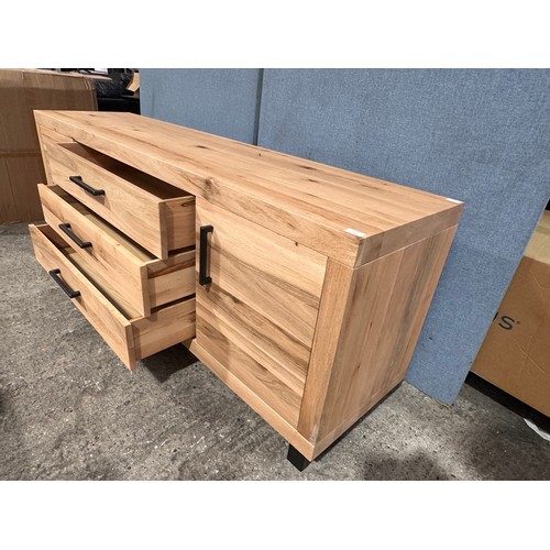 3179 - A solid oak wood two door three drawer sideboard