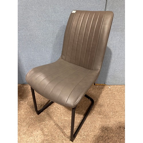 3180 - A solid oak 180cm dining table with 6 mushroom leather dining chairs