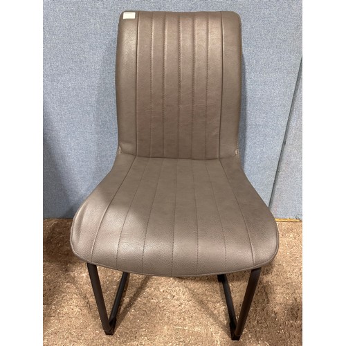 3180 - A solid oak 180cm dining table with 6 mushroom leather dining chairs