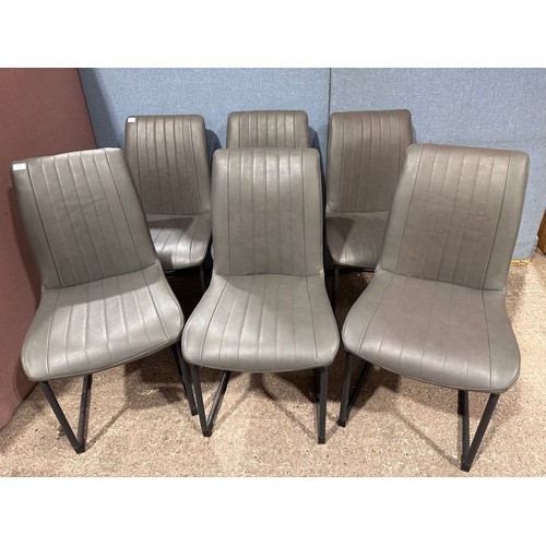 3180 - A solid oak 180cm dining table with 6 mushroom leather dining chairs