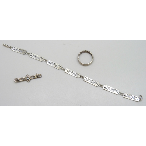 7177 - A collection of silver Celtic style jewellery - a ring (scratches to inner band), O, a Glasgow Rose ... 