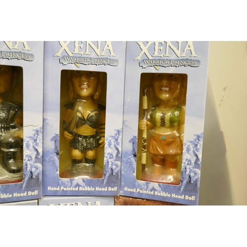 2120 - A large collection of Bobble Head dolls