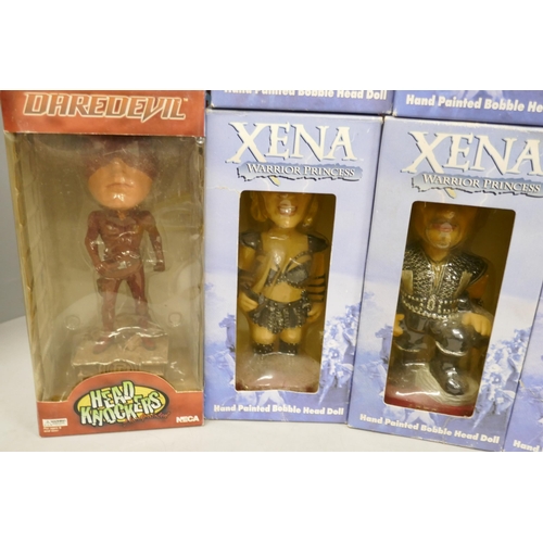2120 - A large collection of Bobble Head dolls