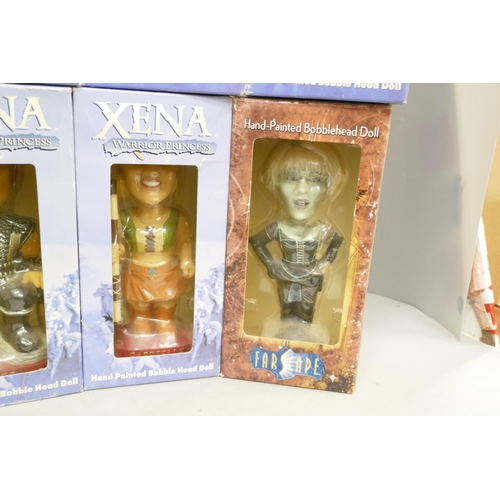 2120 - A large collection of Bobble Head dolls
