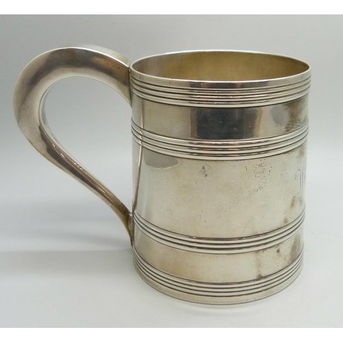 7002 - A George III silver tankard with monogram and crest, inscription dated 1795, John Langlands I & John... 
