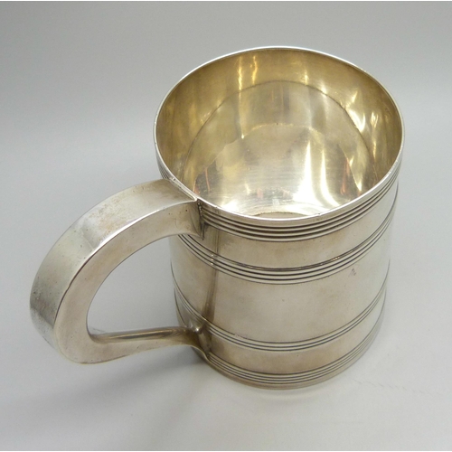 7002 - A George III silver tankard with monogram and crest, inscription dated 1795, John Langlands I & John... 