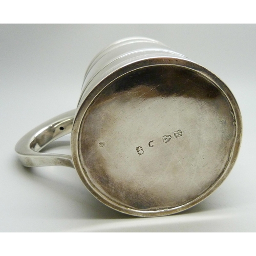 7002 - A George III silver tankard with monogram and crest, inscription dated 1795, John Langlands I & John... 