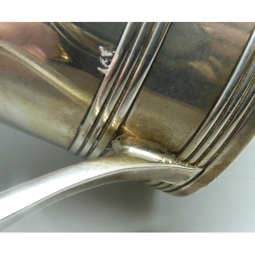 7002 - A George III silver tankard with monogram and crest, inscription dated 1795, John Langlands I & John... 