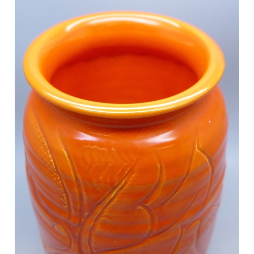 2073 - A Susie Cooper orange vase, standard ware, signed and also marked 1932 England, 17cm