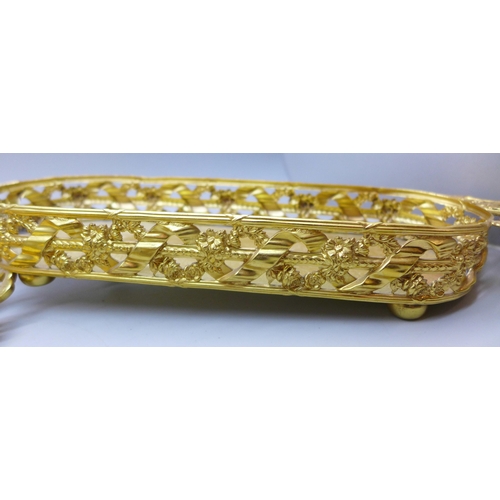 2090 - A gilt metal double ink stand with glass ink wells and a gilt metal tray with fork