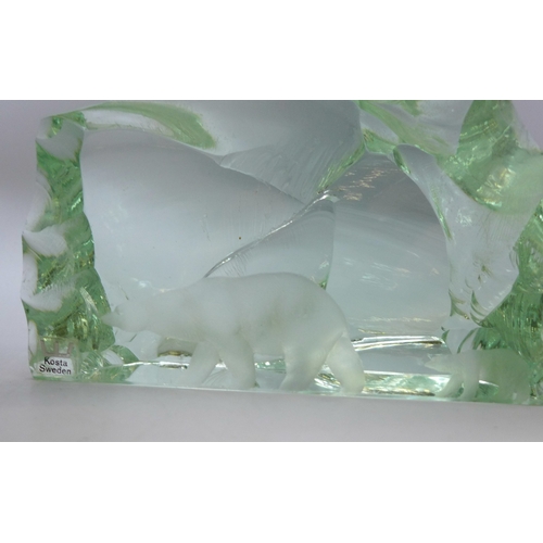 2098 - A glass model of a bull and a Kosta Sweden glass paperweight with polar bear detail