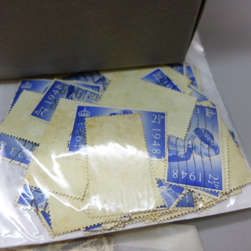 2102 - Stamps; a box containing a duplicated mass of Great Britain stamps, mainly Queen Victoria to King Ge... 