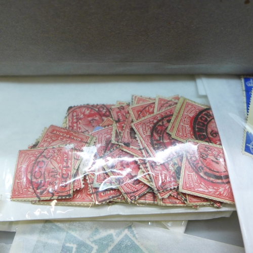 2102 - Stamps; a box containing a duplicated mass of Great Britain stamps, mainly Queen Victoria to King Ge... 