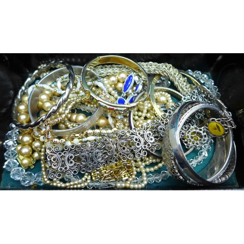 2104 - A collection of costume jewellery, three silver rings, gold-tone locket, etc.