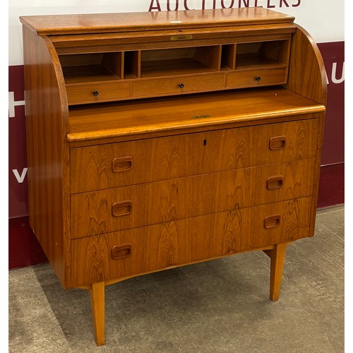 18 - A Swedish S.M.I. teak cylinder bureau, designed by Egon Ostergaard